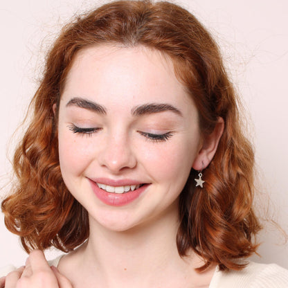 30E3112 - Star Huggie Hoops, Silver