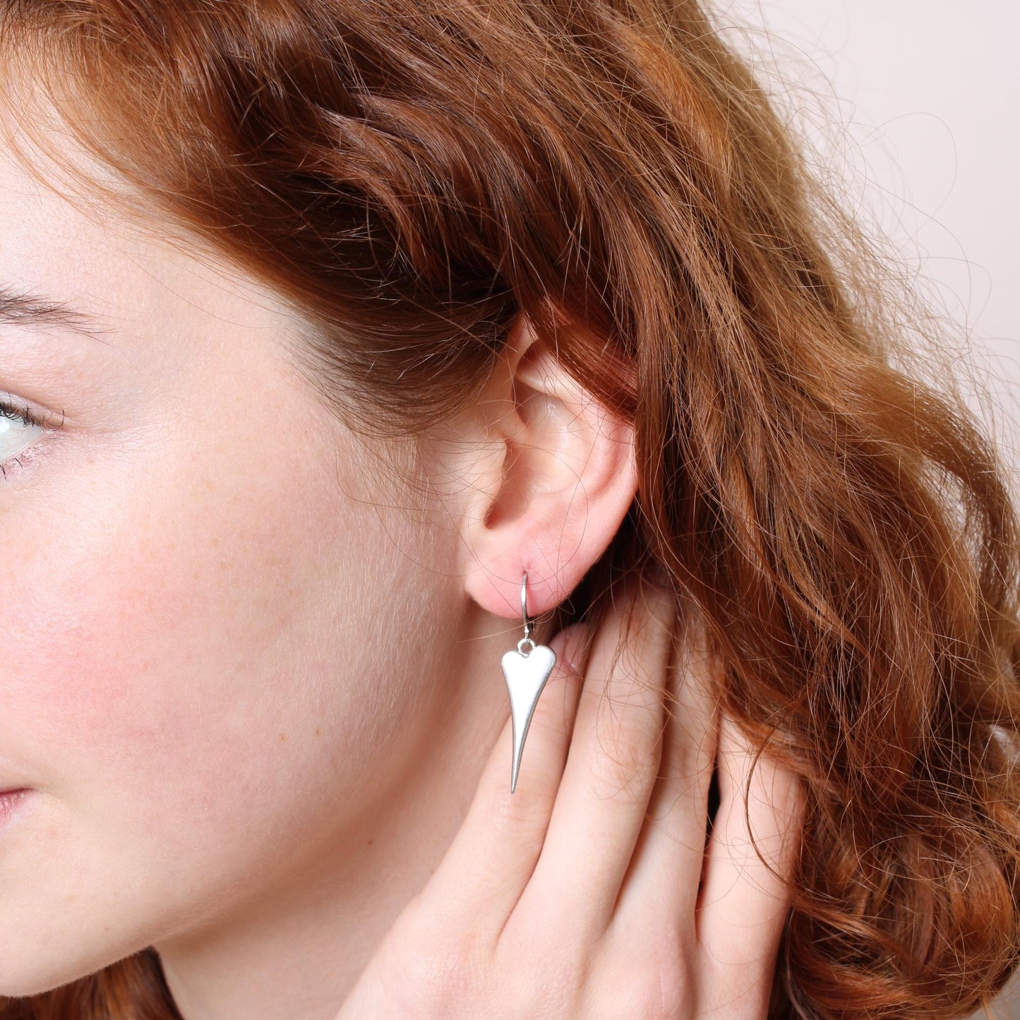 30E3111 - Pointed Heart Huggie Hoops, Silver