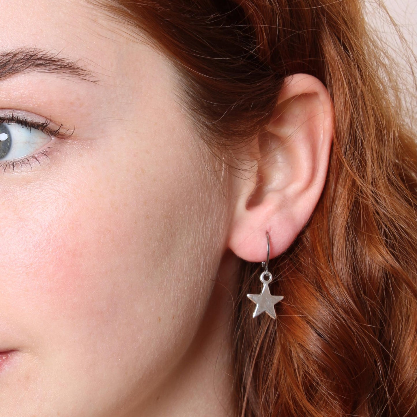 30E3112 - Star Huggie Hoops, Silver